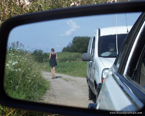 53816-belarusian-country-girl-in-the-rear-view-mirror-braslav-lakes-belarus.jpg