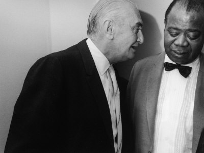 manager-joe-glaser-conferring-with-client-musician-louis-armstrong-after-a-concert.jpg