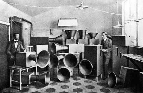 Luigi Russolo and assistant with Intonarumori (noise-making machines), 1913.