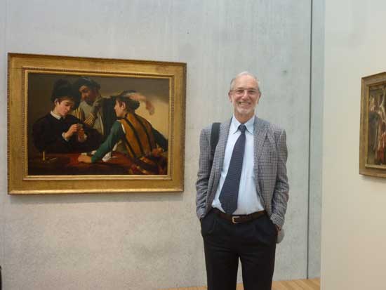 Architect Renzo Piano in front of Kimbell Art Museum's signature Caravaggio, "The Cardsharps," installed on concrete wall in the new Piano Pavilion Photo by Lee Rosenbaum