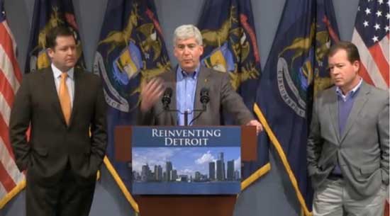 Michigan Gov. Rick Snyder, flanked by House Speaker Jase Bolger (l) and Senate Majority Leader Randy Richardville (r) Screenshot from press conference webcast