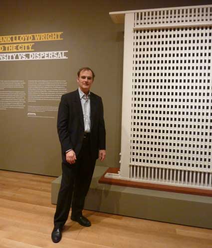 Barry Bergdoll, acting chief curator of architecture and design, Museum of Modern Art, with model of Frank Lloyd Wright's San Francisco Call Building Project, c. 1940 Frank Lloyd Wright Foundation Archives Photo by Lee Rosenbaum