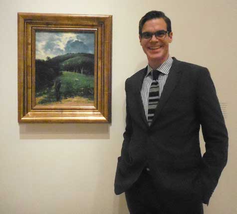Richard Aste with Francisco Oller’s “Mountain Landscape with a Figure,” c. 1900-1903 Photo by Lee Rosenbaum