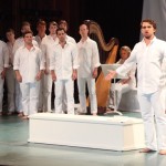 The Ferryman (Edward Nelson) and the Chorus in Benjamin Britten's Curlew River. Photo: Hilary Scott