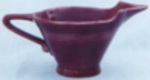 harlequin creamer in maroon.jpg