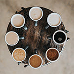 Photo of a tray of coffee cups.