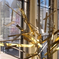 Enormous Golden Modernist Mobile Removed From Lincoln Center Will Be Installed At LaGuardia Airport