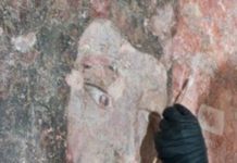 The Delicate Task Of Restoring A Castle’s Medieval Knight Mural