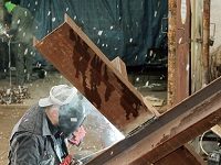 Ukrainian Sculptor From Berlin Stays In Lviv To Help Build Anti-Tank Defenses