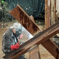 Ukrainian Sculptor From Berlin Stays In Lviv To Help Build Anti-Tank Defenses