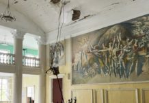 Inside A Bombed Ukrainian Cultural Center, Where Residents Have Taken Refuge