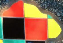 France’s Anonymous Street Artist Fills The Cracks With Colorful Mosaics