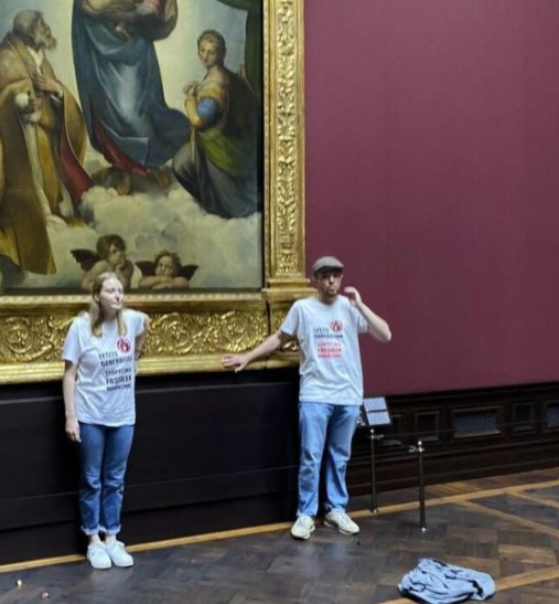 Two Art Vandals Who Glued Themselves To A Raphael Painting Fined $1,600 Each