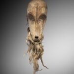 An Elderly Couple, A Bric-A-Brac Dealer, And Gabonese In France Are Fighting Over A Rare Mask