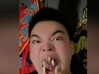The Traditional Chinese Art Of Acting And Singing With Boar Tusks In Your Mouth