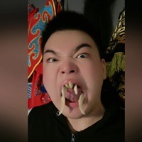 The Traditional Chinese Art Of Acting And Singing With Boar Tusks In Your Mouth
