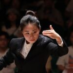 Conducting An Orchestra Made Up Entirely Of Traditional Chinese Instruments