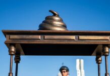 A Sculpture Of A Desk With Poop On It Appeared On The National Mall. Is It Really Art?