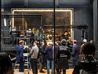 Working In Public View, Conservators Begin Restoration of Rembrandt’s “Night Watch”