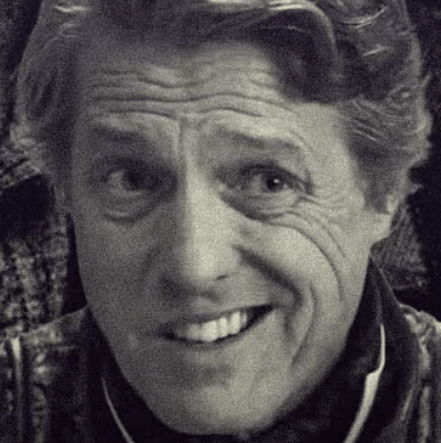 Why Hugh Grant Makes Such A Great Villain