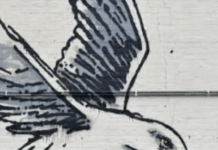 What To Do If You Wake Up With A Banksy On Your House