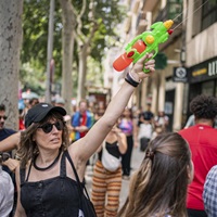 How Did A Giant Water Pistol Get To Be The Symbol, And Preferred Weapon, Of Europe’s Movement Against Overtourism?