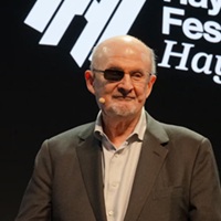 Salman Rushdie Explains Why AI Isn’t A Threat To Fiction Writers (Yet)