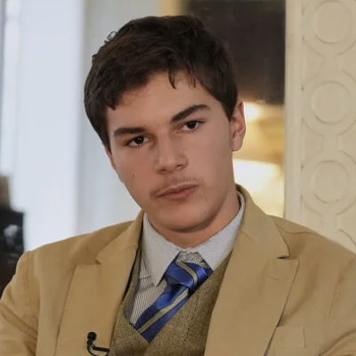 Turns Out The Louvre Photo’s ‘Fedora Man’ Is A 15-Year-Old French Teen Who Loves To Dress Rather Nattily