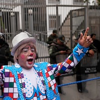 Clowns March Through Bolivia’s Capital To Protest New School Law