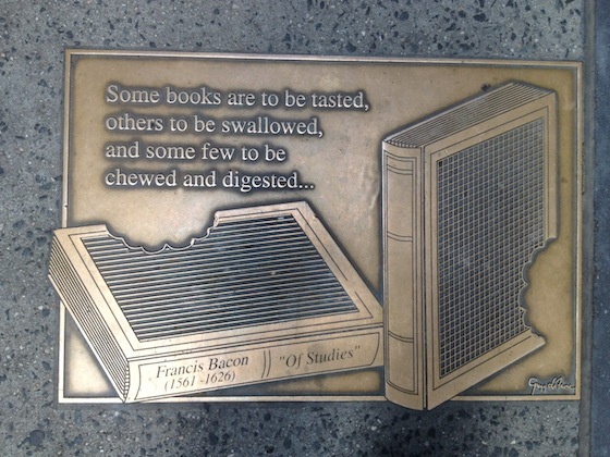 One of the 96 plaques of Library Walk designed by Greenwich Village sculptor Gregg Lefevre.