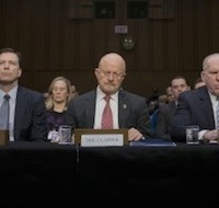 The lineup: U.S. intelligence officials testified yesterday in an annual hearing before the Senate Intelligence Committee. Clapper is the center figure. [Photo: Pablo Martinez Monsivais/AP]