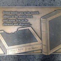 One of the 96 plaques of Library Walk designed by Greenwich Village sculptor Gregg Lefevre.