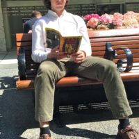 Civilian reading 'Naked Lunch' in midtown Manhattan.