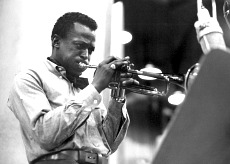 Miles Davis facing right