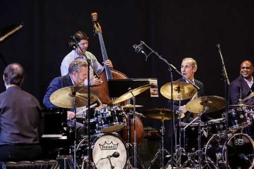 Drummers Jeff Hamilton (L) and Joe LaBarbera (R) lead the Faculty All-Star Big Band Tribute to Woody Herman, at 2016 Jazz Port Townsend. Travis Ranney, tenor; Jay Thomas, tenor; Tracy Knoop, tenor; Gary Smulyan, bari sax; Brad Allison, trumpet; Sean Jones, trumpet; Terell Stafford, trumpet; Thomas Marriott, trumpet; Oliver Groenewald, trumpet; Wycliffe Gordon, trombone; David Marriott, trombone; Greg Schroeder, trombone; John Hansen, piano; Jon Hamar, bass; Jeff Hamilton, drums; Joe LaBarbera, drums